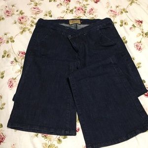 Dark wash, wide leg, stretchy jeans.